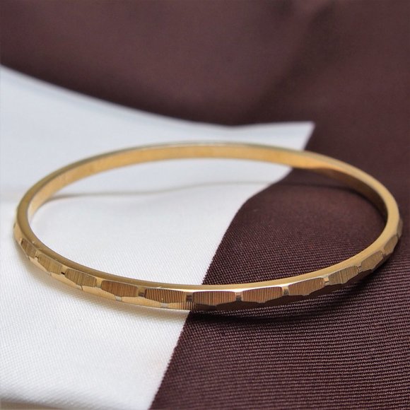 Monet Jewelry - Classy Shiny Etched Gold-Tone Monet Bangle